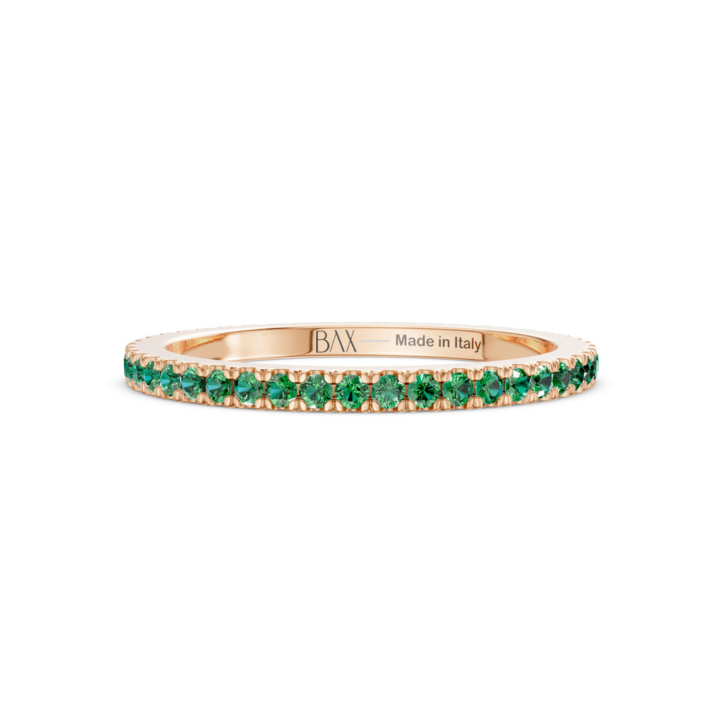 18kt rose gold and emerald eternity ring